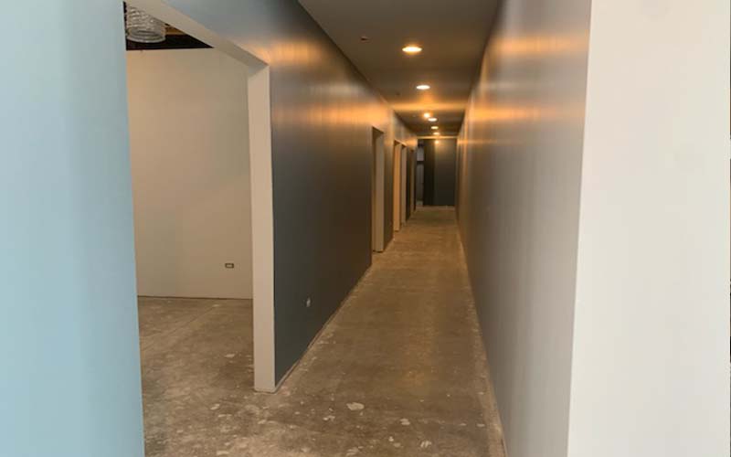 hallway made of drywall with white paint